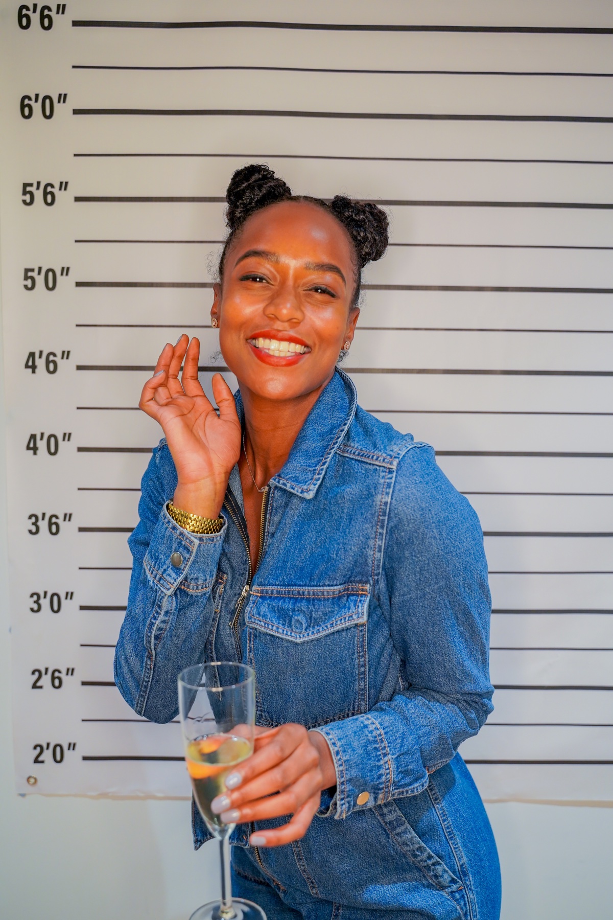 Guest smiling with a drink at the Chop Chop opening event