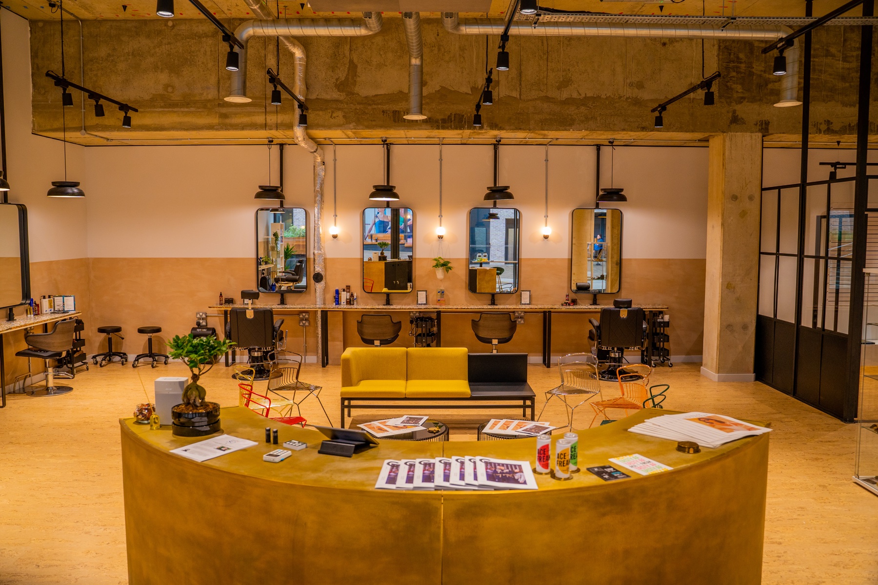 Reception desk and open commercial floor photographed head-on